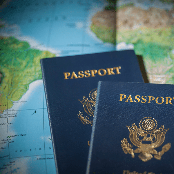 Two passports on top of a map